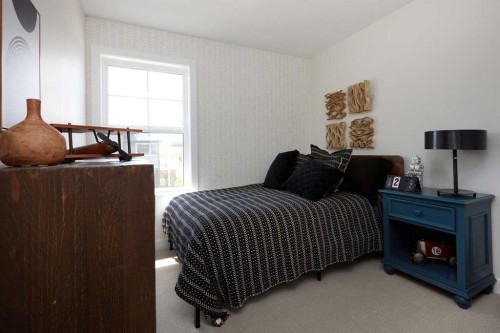 80 Emberside Grove, Cochrane, AB - Indoor Photo Showing Bedroom