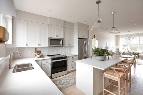 80 Emberside Grove, Cochrane, AB - Indoor Photo Showing Kitchen With Double Sink With Upgraded Kitchen