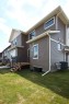 80 Emberside Grove, Cochrane, AB  - Outdoor With Deck Patio Veranda 