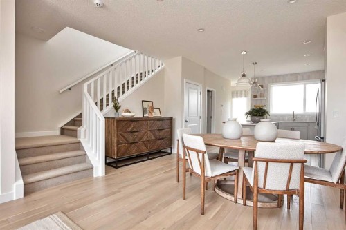 80 Emberside Grove, Cochrane, AB - Indoor Photo Showing Dining Room