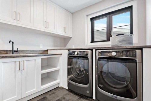 57 Larratt Close, Red Deer, AB - Indoor Photo Showing Laundry Room