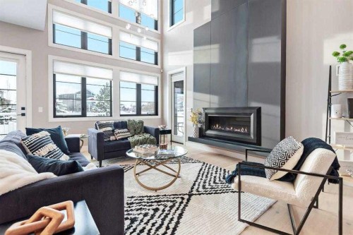 57 Larratt Close, Red Deer, AB - Indoor Photo Showing Living Room With Fireplace