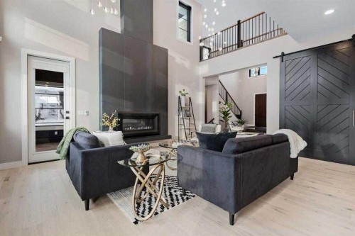 57 Larratt Close, Red Deer, AB - Indoor Photo Showing Living Room With Fireplace