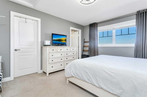 11 Craig Road, Sylvan Lake, AB - Indoor Photo Showing Bedroom