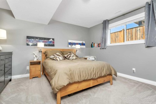 11 Craig Road, Sylvan Lake, AB - Indoor Photo Showing Bedroom
