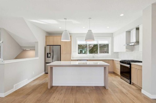 413 Shawnee Terrace Sw, Calgary, AB - Indoor Photo Showing Kitchen With Upgraded Kitchen