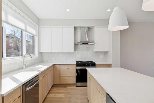 413 Shawnee Terrace Sw, Calgary, AB - Indoor Photo Showing Kitchen With Upgraded Kitchen