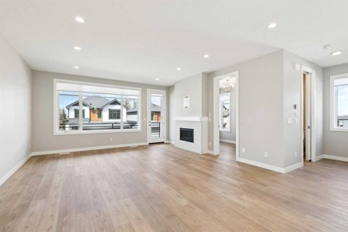 413 Shawnee Terrace Sw, Calgary, AB - Indoor Photo Showing Living Room