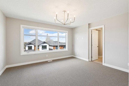 413 Shawnee Terrace Sw, Calgary, AB - Indoor Photo Showing Other Room