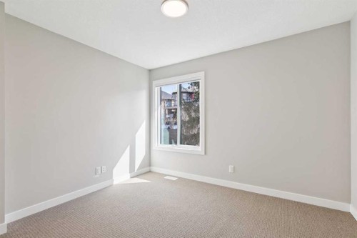 413 Shawnee Terrace Sw, Calgary, AB - Indoor Photo Showing Other Room