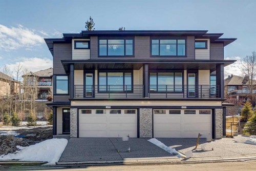 413 Shawnee Terrace Sw, Calgary, AB - Outdoor With Balcony With Facade