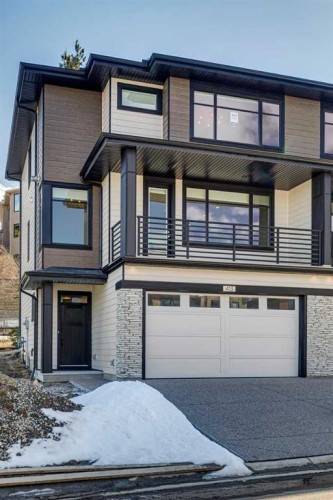 413 Shawnee Terrace Sw, Calgary, AB - Outdoor With Balcony With Facade