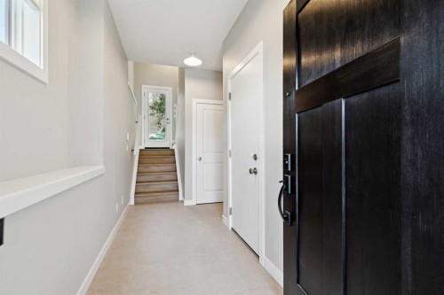 413 Shawnee Terrace Sw, Calgary, AB - Indoor Photo Showing Other Room