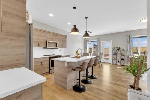 31 Vanson Close, Sylvan Lake, AB - Indoor Photo Showing Kitchen With Upgraded Kitchen