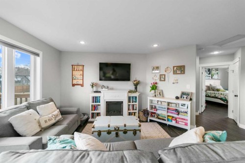 5007 52 Street, Amisk, AB - Indoor Photo Showing Living Room With Fireplace