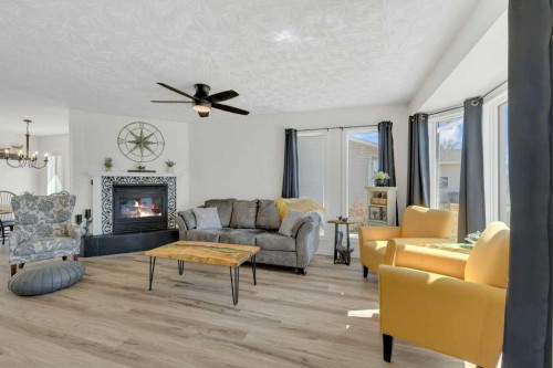 4702 57 Ave, Rimbey, AB - Indoor Photo Showing Living Room With Fireplace