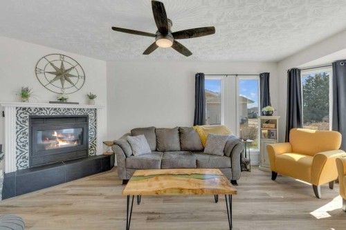 4702 57 Ave, Rimbey, AB - Indoor Photo Showing Living Room With Fireplace