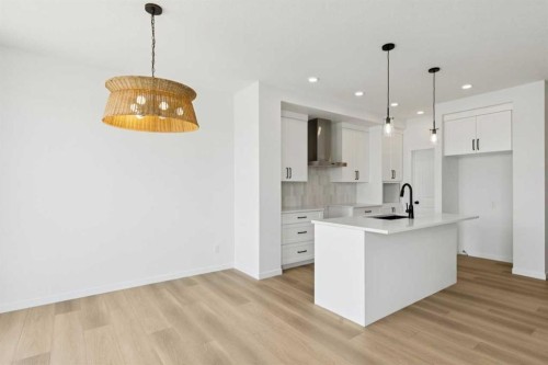 17 Southborough Common, Cochrane, AB - Indoor Photo Showing Kitchen