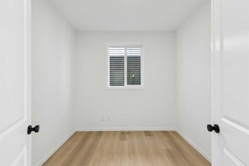 17 Southborough Common, Cochrane, AB - Indoor Photo Showing Other Room