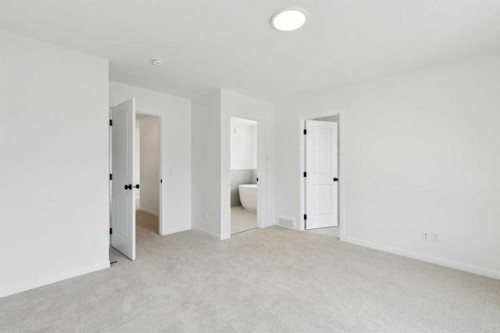 17 Southborough Common, Cochrane, AB - Indoor Photo Showing Other Room