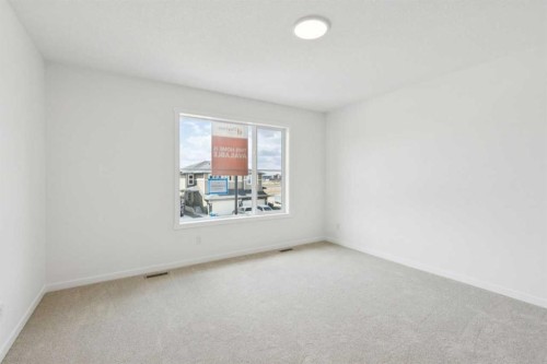17 Southborough Common, Cochrane, AB - Indoor Photo Showing Other Room
