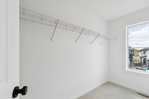 17 Southborough Common, Cochrane, AB - Indoor With Storage