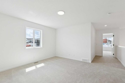 17 Southborough Common, Cochrane, AB - Indoor Photo Showing Other Room