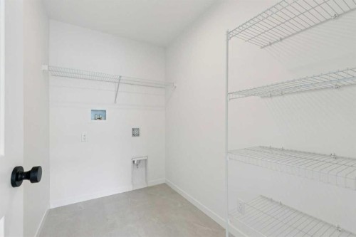 17 Southborough Common, Cochrane, AB - Indoor With Storage