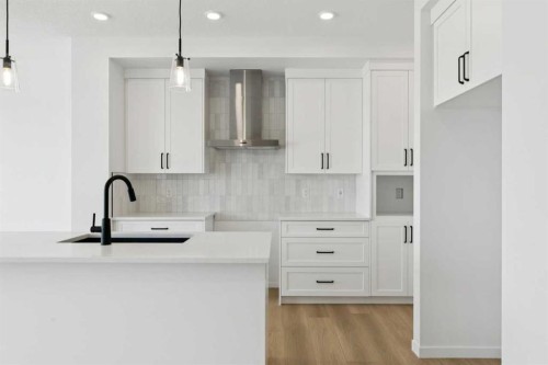 17 Southborough Common, Cochrane, AB - Indoor Photo Showing Kitchen
