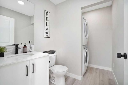 206 Cambridge Way, Sylvan Lake, AB - Indoor Photo Showing Laundry Room