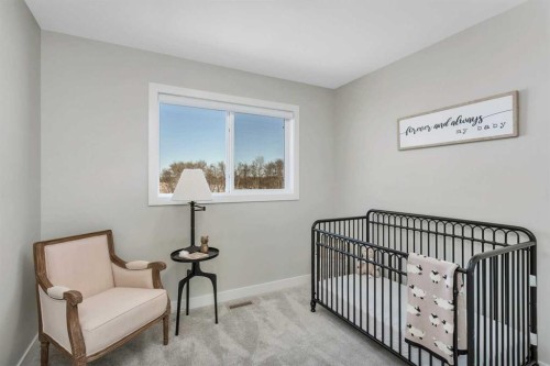 206 Cambridge Way, Sylvan Lake, AB - Indoor Photo Showing Bedroom