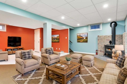 5 Freemont Close, Red Deer, AB - Indoor Photo Showing Living Room With Fireplace