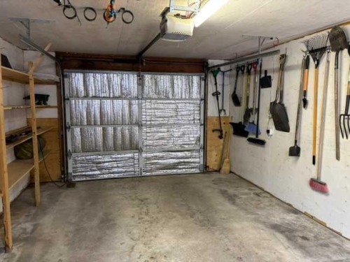 5 Freemont Close, Red Deer, AB - Indoor Photo Showing Garage