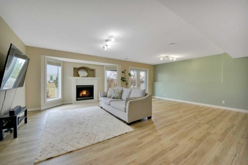 50 Langford Crescent, Red Deer, AB - Indoor Photo Showing Living Room With Fireplace