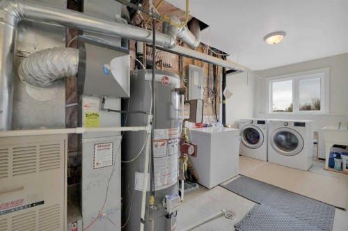 50 Langford Crescent, Red Deer, AB - Indoor Photo Showing Laundry Room