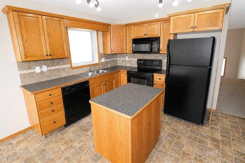 60 Vickers Close, Red Deer, AB - Indoor Photo Showing Kitchen With Double Sink