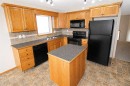 60 Vickers Close, Red Deer, AB  - Indoor Photo Showing Kitchen With Double Sink 