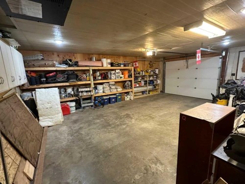 702 Royal Drive, Trochu, AB - Indoor Photo Showing Garage