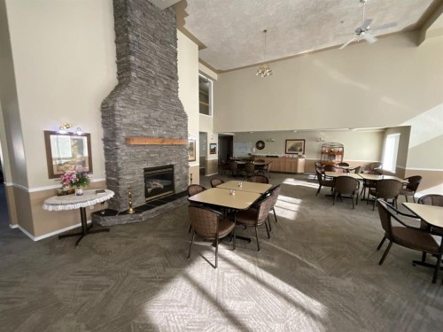 214-56 Carroll Crescent, Red Deer, AB - Indoor With Fireplace