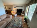 214-56 Carroll Crescent, Red Deer, AB  - Indoor Photo Showing Living Room 