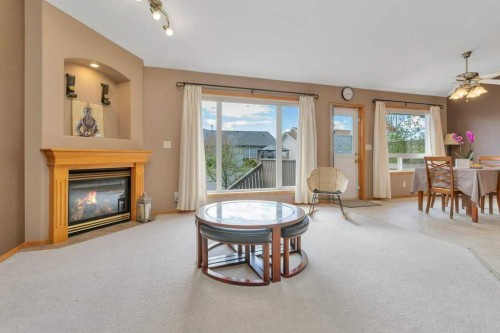 27 Ramage Crescent, Red Deer, AB - Indoor Photo Showing Living Room With Fireplace