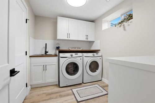 8 Willow Place, Lacombe, AB - Indoor Photo Showing Laundry Room