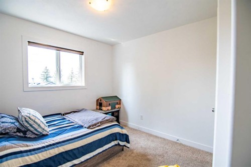 172 Ibbotson Close, Red Deer, AB - Indoor Photo Showing Bedroom