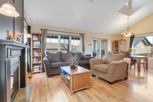 100 Wade Close, Red Deer, AB - Indoor Photo Showing Living Room With Fireplace