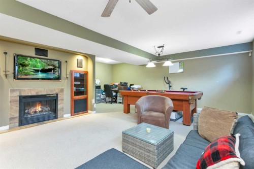 100 Wade Close, Red Deer, AB - Indoor With Fireplace
