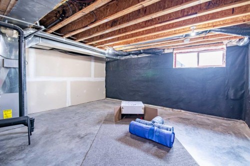 6-2002 22 Avenue, Bowden, AB - Indoor Photo Showing Basement