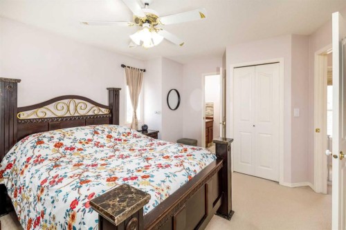 49 Kirkland Drive, Red Deer, AB - Indoor Photo Showing Bedroom