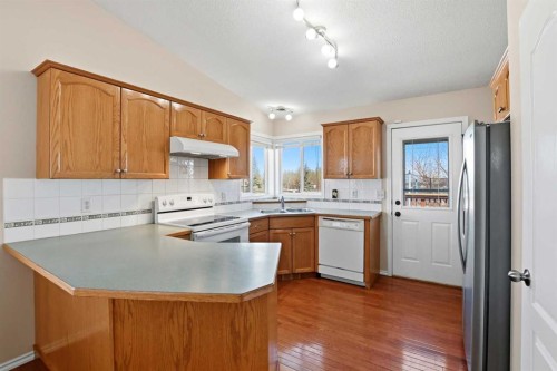 2 Lewis Close, Red Deer, AB - Indoor Photo Showing Kitchen With Double Sink