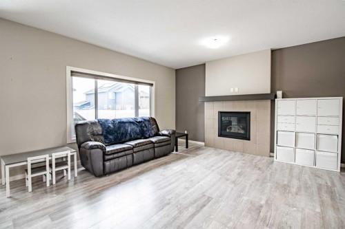 22 Caribou Crescent, Red Deer, AB - Indoor Photo Showing Living Room With Fireplace