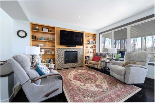 20 Ingle Close, Red Deer, AB - Indoor Photo Showing Living Room With Fireplace